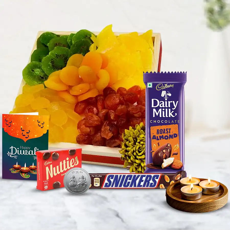 All-in-One Diwali Gift Hamper with wooden tray filled with dried fruits, Cadbury chocolates, tea light candles, Ganesh Laxmi coin, and Diwali wishing card