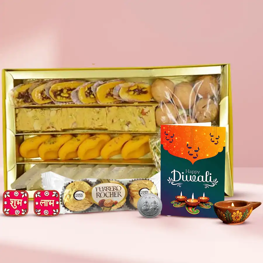 Hope N Happiness Diwali Gift Box featuring traditional sweets, Ferrero Rocher chocolates, mini samosas, a diya, Shubh Labh wall stickers, a silver-plated Ganesh Laxmi coin, and a Diwali card.
