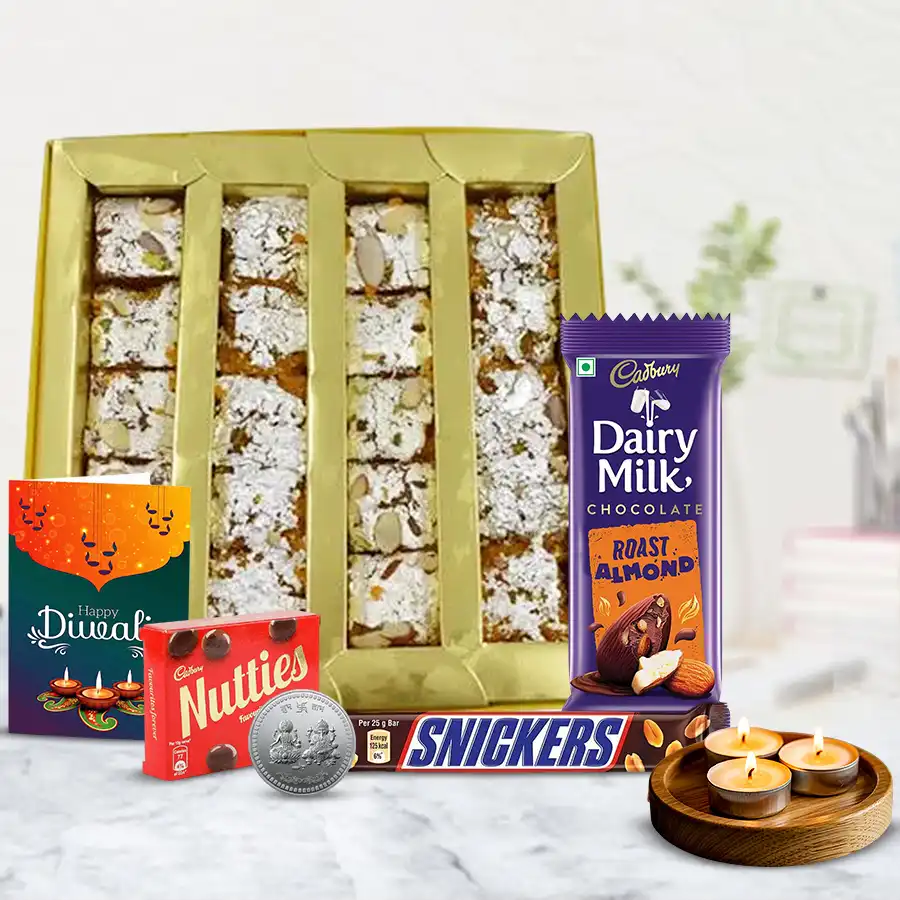 Sweet Touch Diwali Gift Box containing sweets, chocolates, tea light candles, a silver-plated coin, and a wishing card.