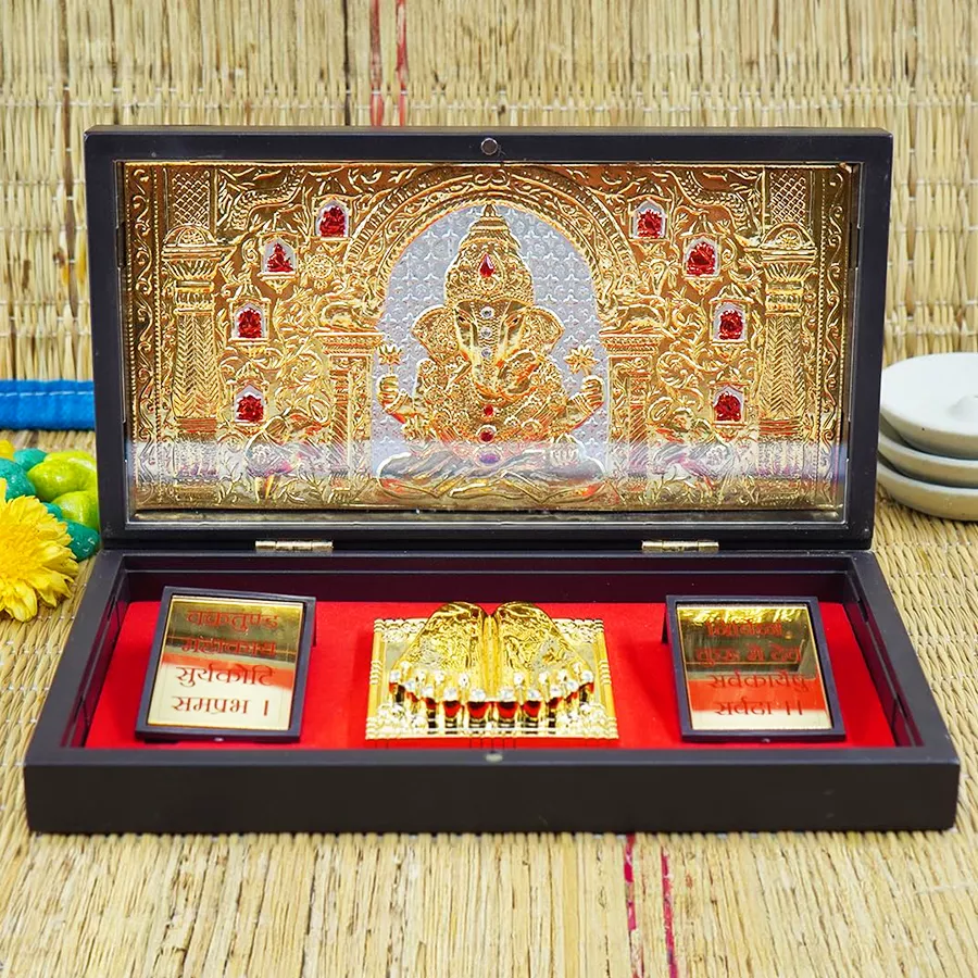 Gold plated Ganesha photo frame with Charan Paduka, wooden design, multicolor finish, dimensions 11.5 CM x 21 CM.