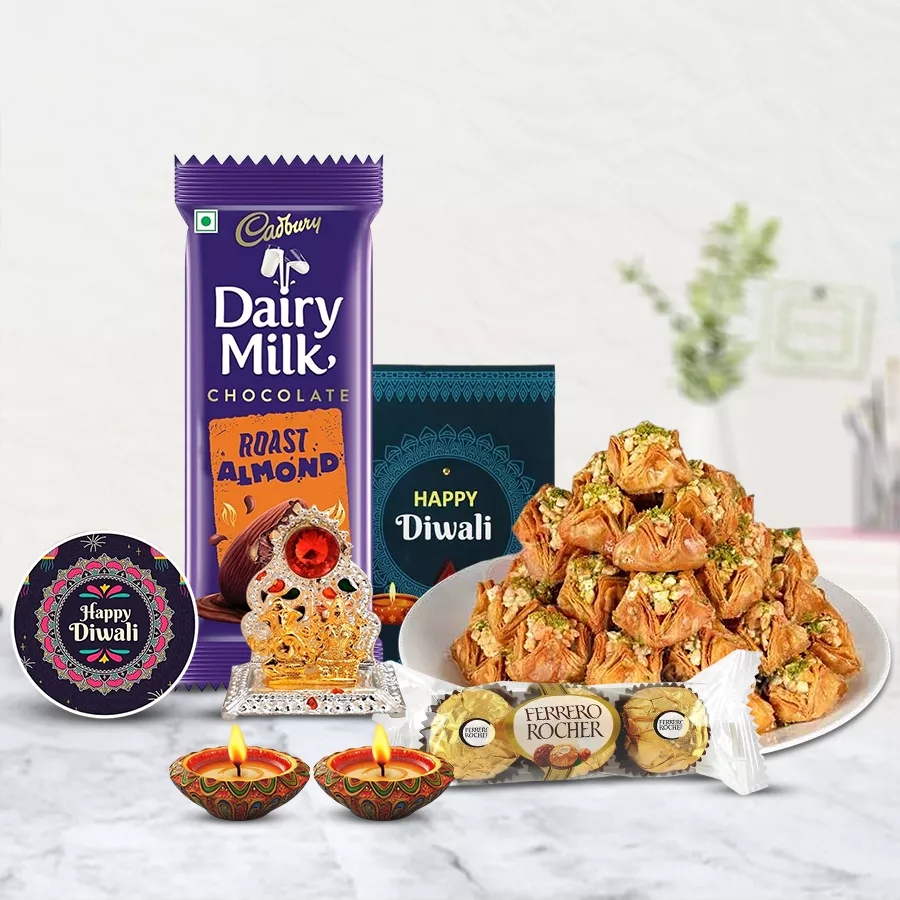 Happy Box of Pyramid Baklava and Choco for Diwali featuring baklava, chocolates, Diyas, a fridge magnet, a Ganesh Lakshmi Mandap, and a Diwali card.