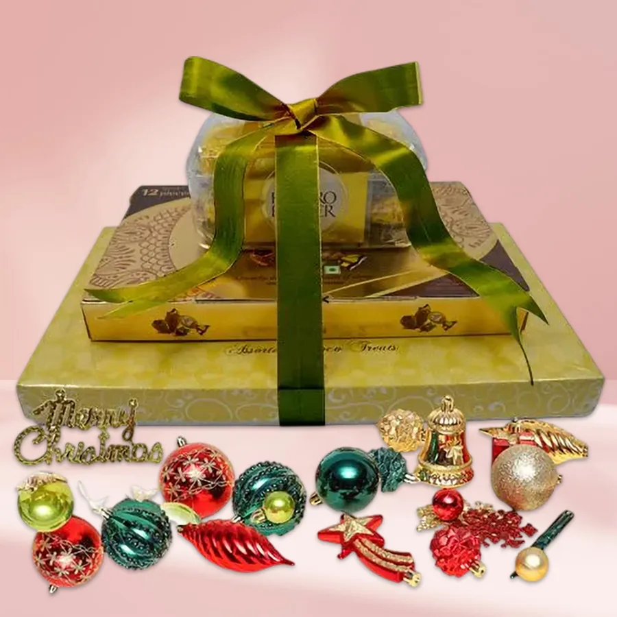 Christmas Special Chocolate Tower featuring Luxure Truffle Chocolates, Ferrero Rocher Moments, and Ferrero Rocher Hazelnut Chocolates in a decorative box
