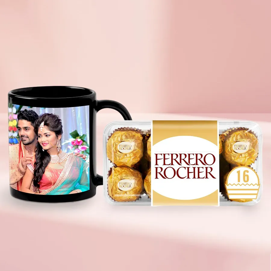 Customized coffee mug with red heart handle next to a Ferrero Rocher chocolate box