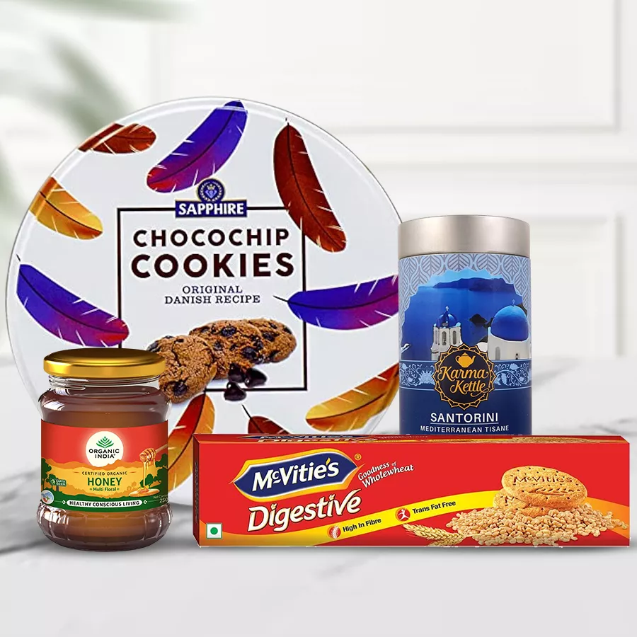 Aromatic Tea with Chocochip Cookies Gift Box containing tea, cookies, digestive biscuits, and honey.