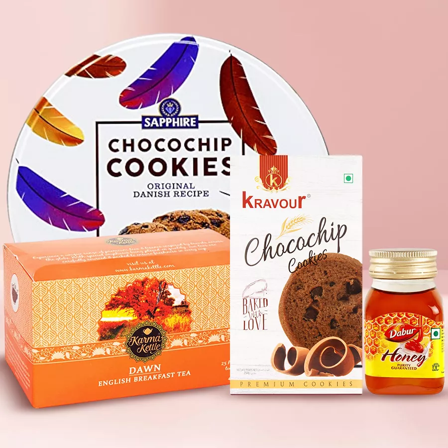 Marvelous Tea Hamper of Wellness with tea, cookies, and honey arranged beautifully