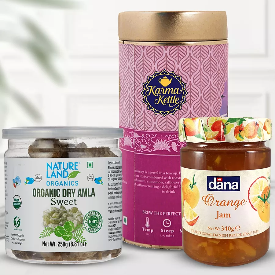 Blissful Gift of Karma Kettle Gulmarg Tea bundle featuring tea, Dana Jam, and Amla Candy in an attractive presentation