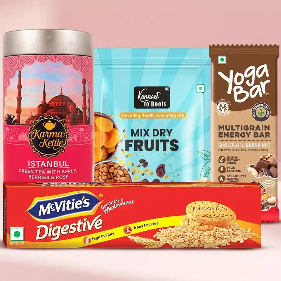 Superb Istanbul Tea Hamper featuring Karma Kettle Istanbul Tea, McVitie’s Digestive Cookies, Healthy Dry Fruit N Nut Mix, and Yoga Bar Protein Bar arranged together in a decorative setting.