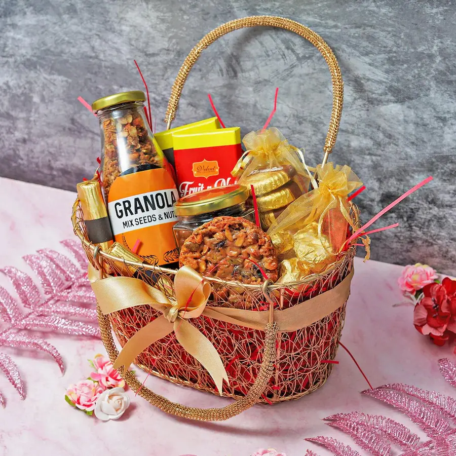 Luxurious Mother's Day basket filled with assorted chocolates, granola, butterscotch, and almond florentines