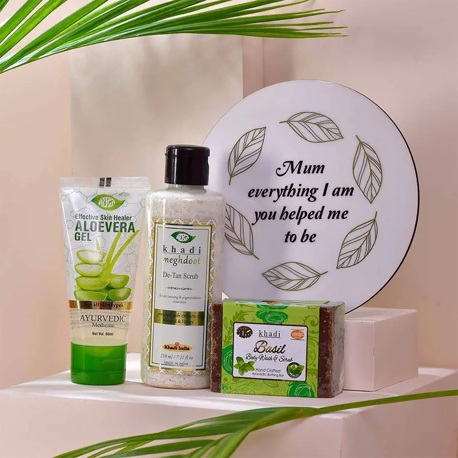 Thankful Memento with Skincare Essentials for Mom including acrylic memento, Aloe Vera Gel, De-Tan Scrub, and Basil Body Wash Soap displayed elegantly