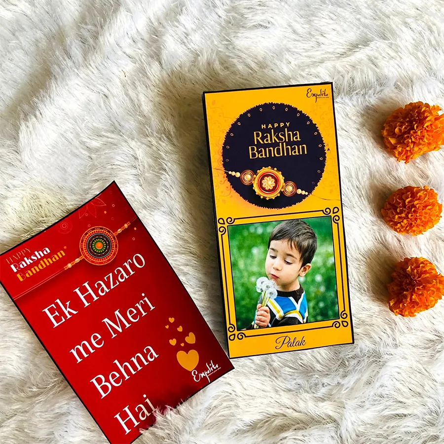Personalized chocolate and Rakhi card hamper for sister with a customized box featuring her name, photo, and festive design