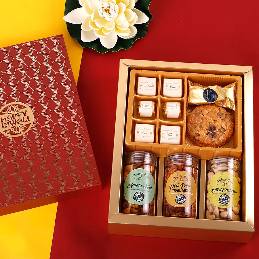 Variety of nuts and chocolates arranged in a festive hamper for Diwali celebration