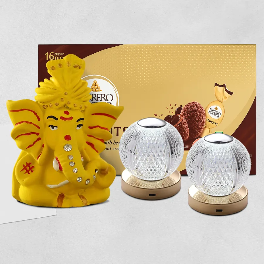 Radiant Wishes Diwali Gift Collection featuring a Pagdi Ganesh idol, Ferrero Rocher Moments, and two crystal LED lights in a festive setting.
