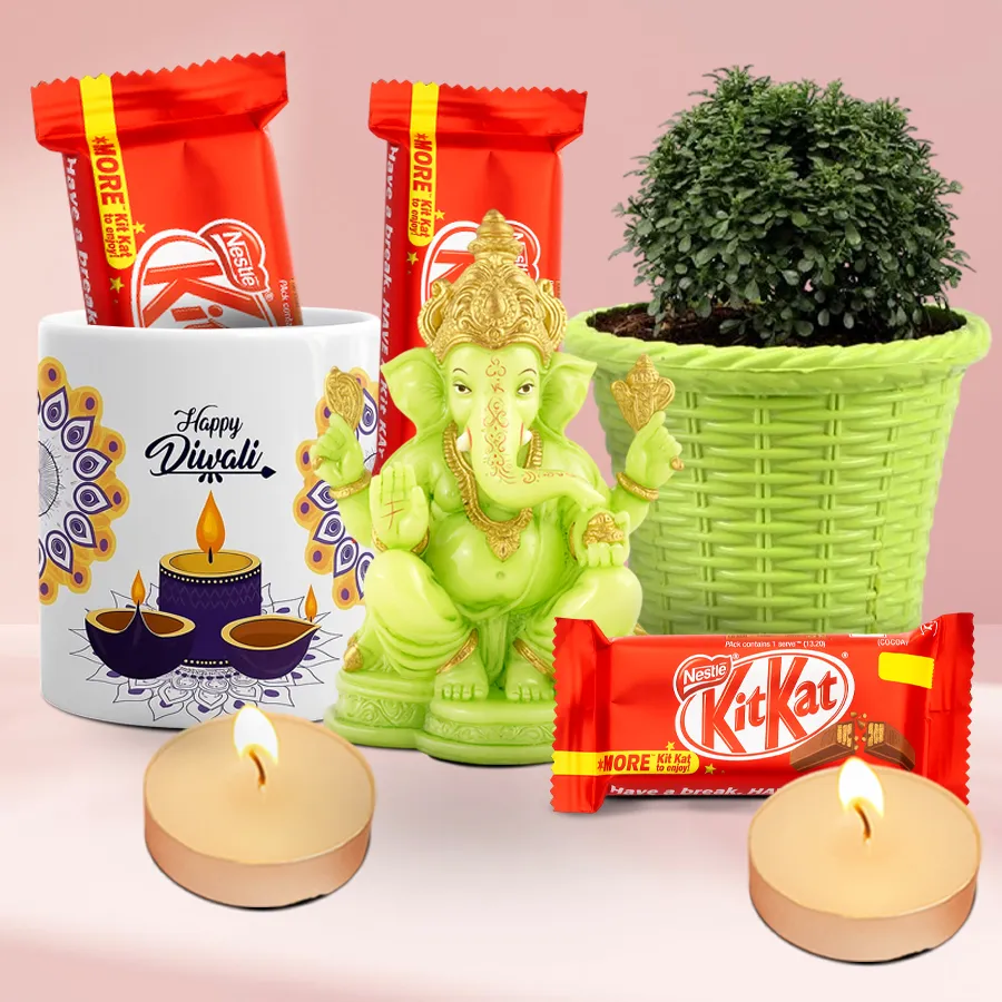Ultimate Diwali Gift Hamper featuring a Designer Glowing Ganesh Idol, Indoor Kamini Plant, Happy Diwali ceramic mug, Nestle KitKat chocolates, and scented T-light candles.