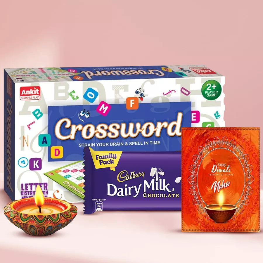 Diya and Chocolate Diwali Delight hamper featuring a traditional diya and a Dairy Milk Family Pack of chocolates
