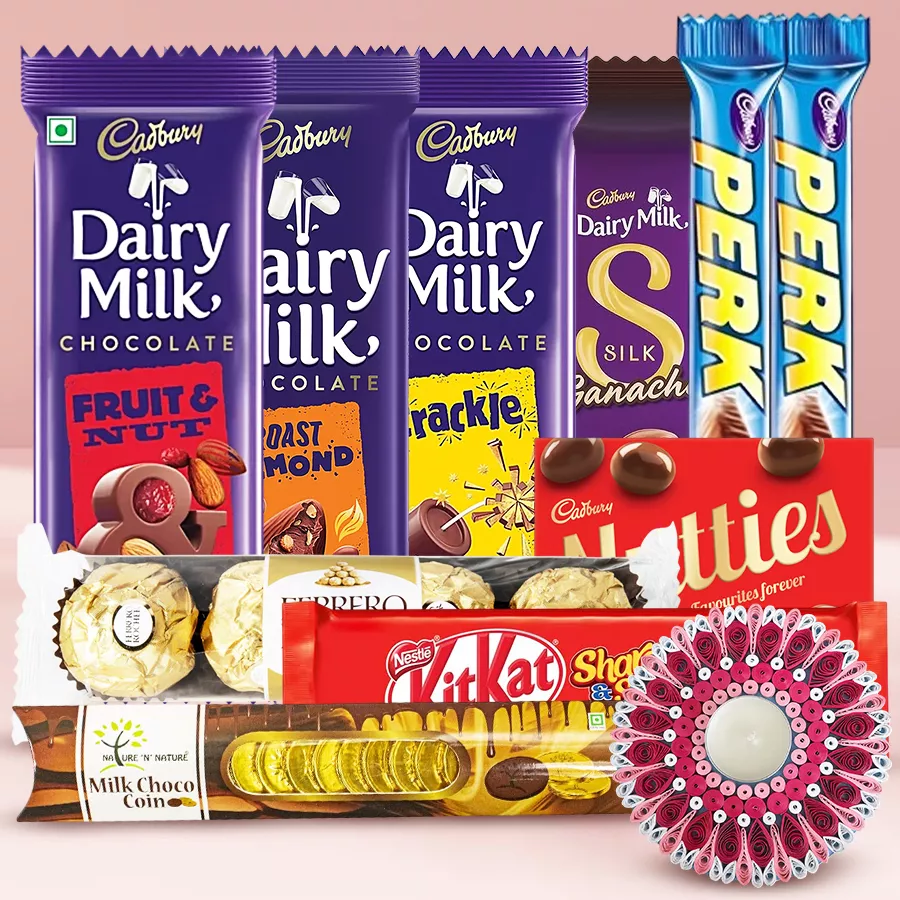 Luxurious Chocolate Affair gift set featuring assorted Cadbury Dairy Milk chocolates, Ferrero Rocher, Nestle KitKat Share Snap, Cadbury Perks, Gold Coin-shaped chocolates, and a beautifully designed T-Light Candle.