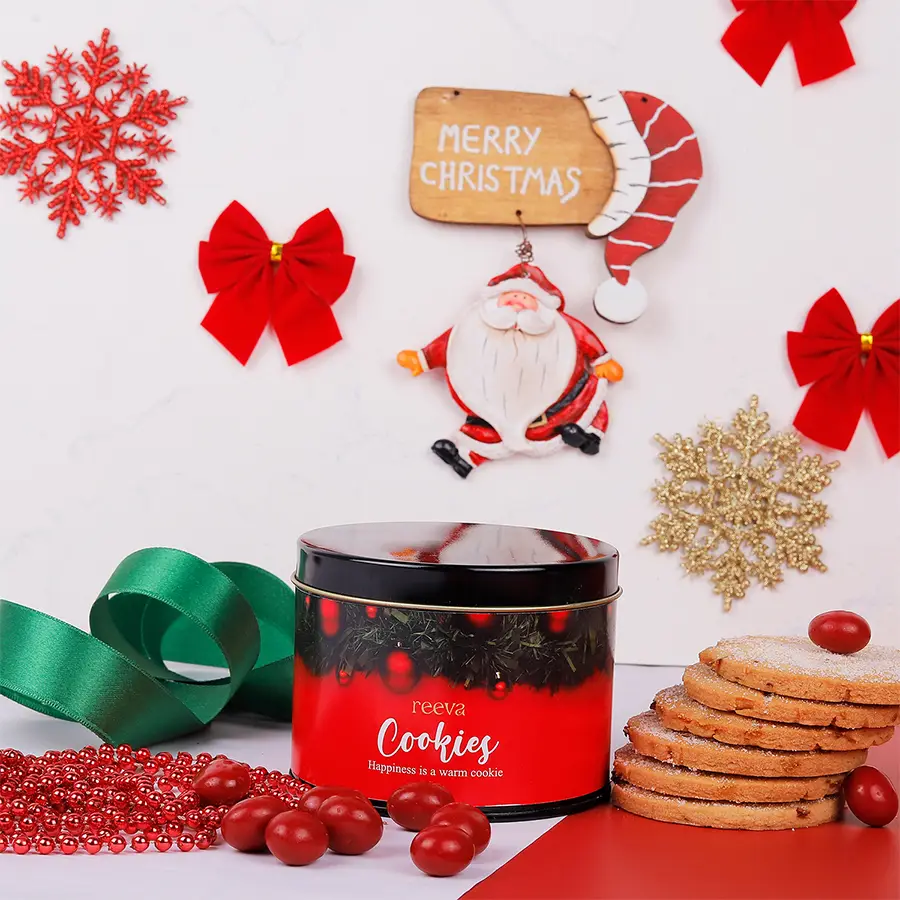 Handcrafted orangy shortbread cookies with cranberries in a charming gift box