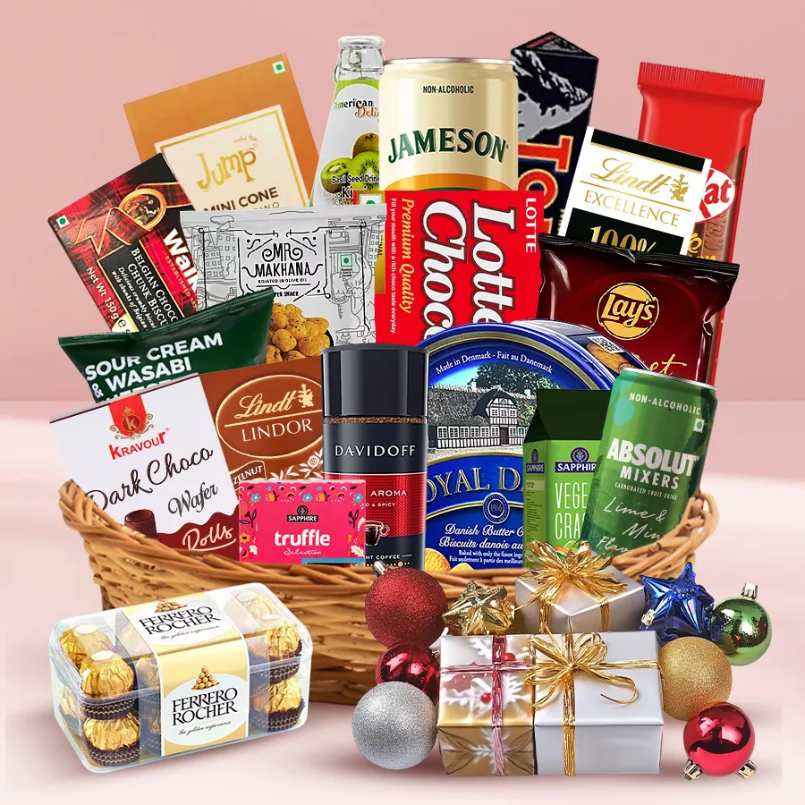 Exotic Christmas Delights Hamper filled with gourmet chocolates, savory snacks, rich coffees, and festive treats arranged in a charming basket.