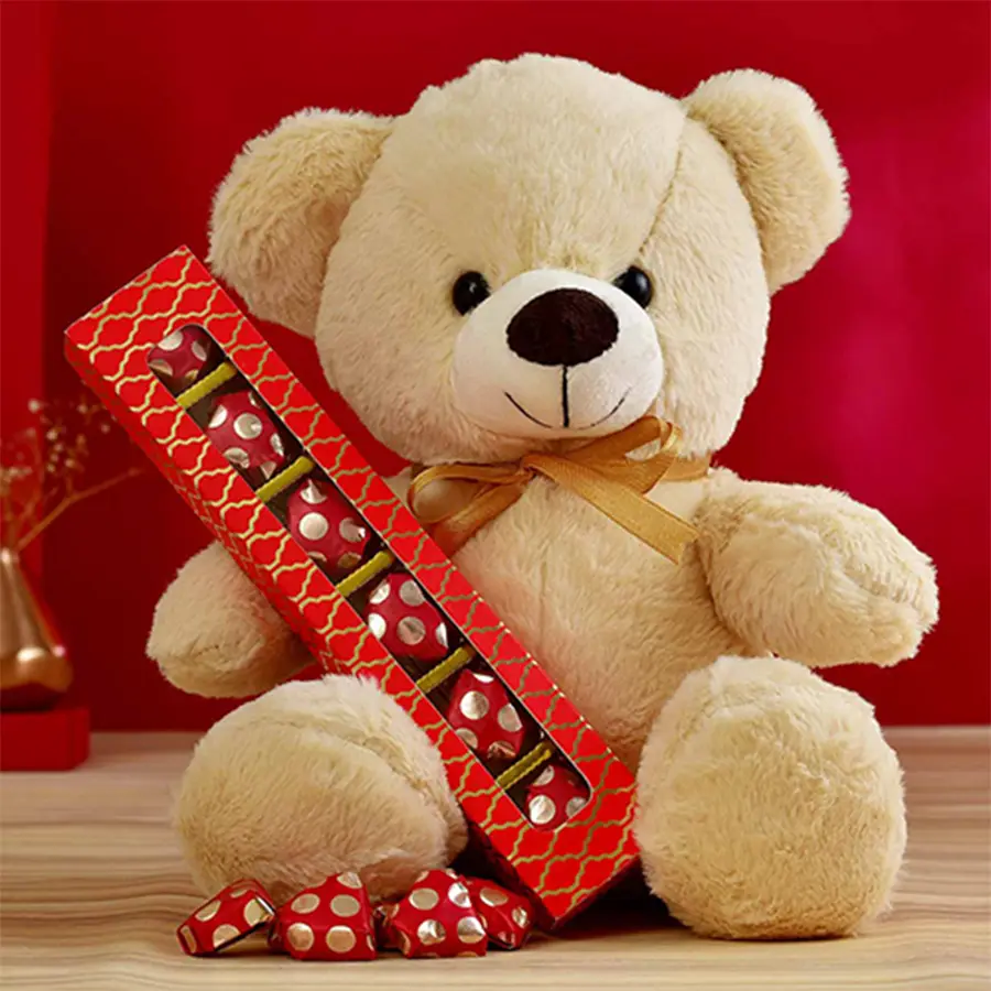 Heartfelt Treats N Gifts Hamper featuring heart-shaped chocolates and a plush teddy bear