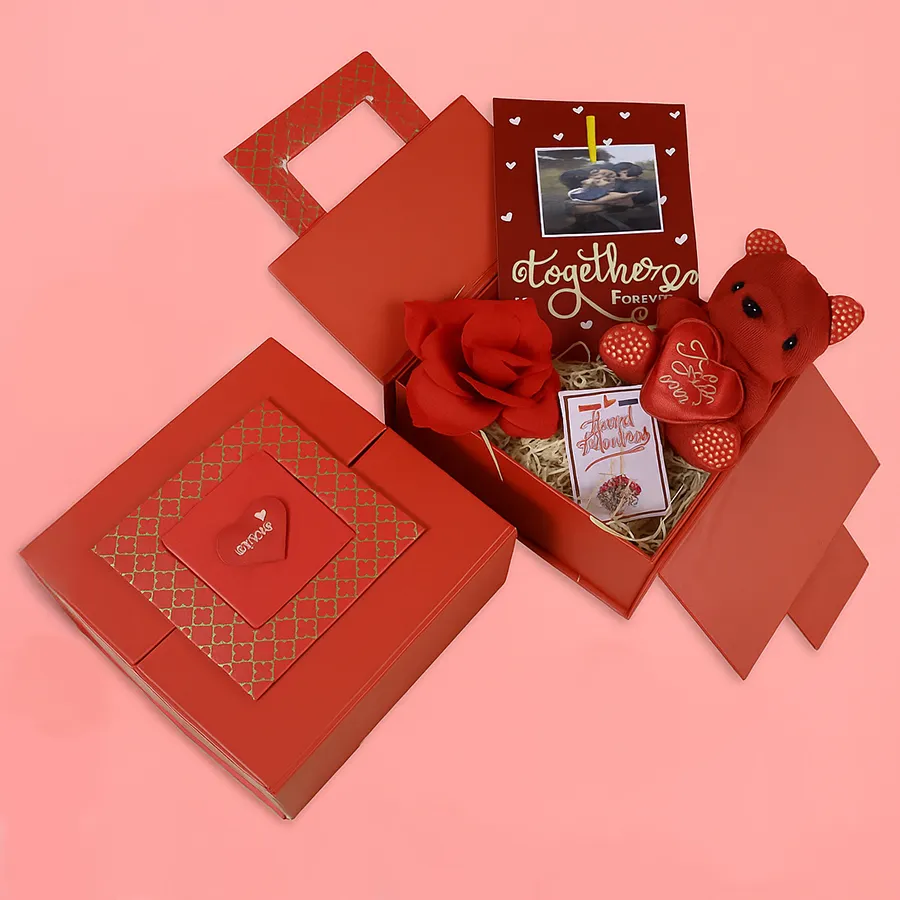 Romantic Valentine Gift Set for Her featuring a teddy bear, wall sticker, artificial rose, and necklace in a red box.
