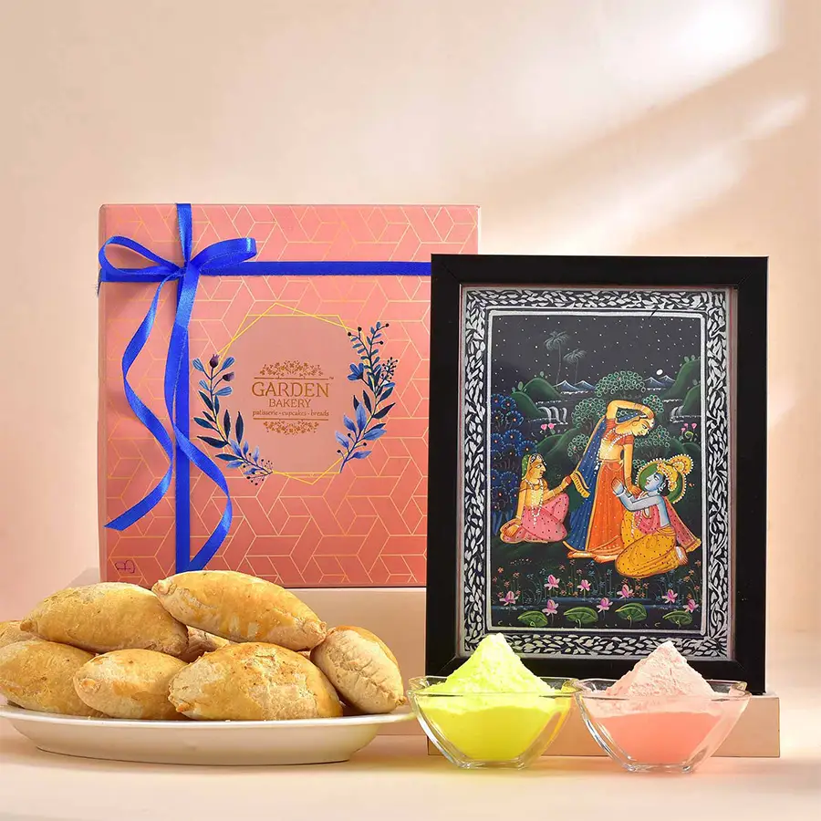 Radiant Holi Hamper featuring Gujiya, Radha-Krishna painting, and organic Gulals