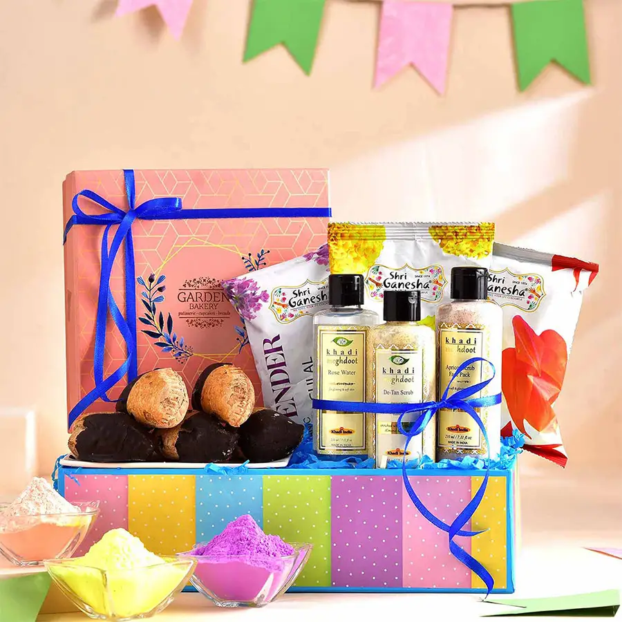 Sweet Treat N Holi Skincare Hamper with chocolate dipped gujiya, skincare products, and organic gulals
