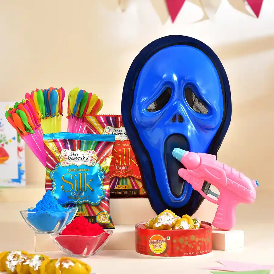 Divine Holi Treats N Gifts Hamper with colorful kids masks, water guns, baby gujiya, fragrant gulal, balloons, and a custom Holi card
