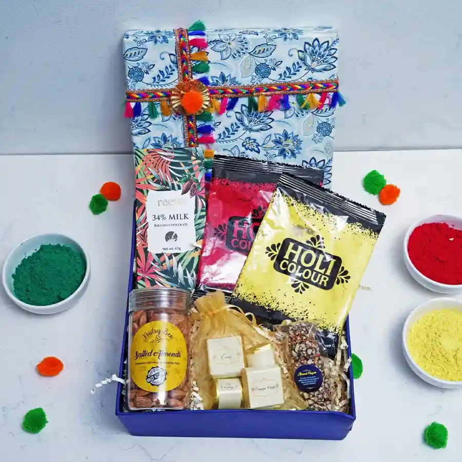 Chocolaty Bliss N Holi Colour Hamper featuring Belgian chocolate, salted almonds, assorted chocolates, almond finger, and packets of Holi colors.