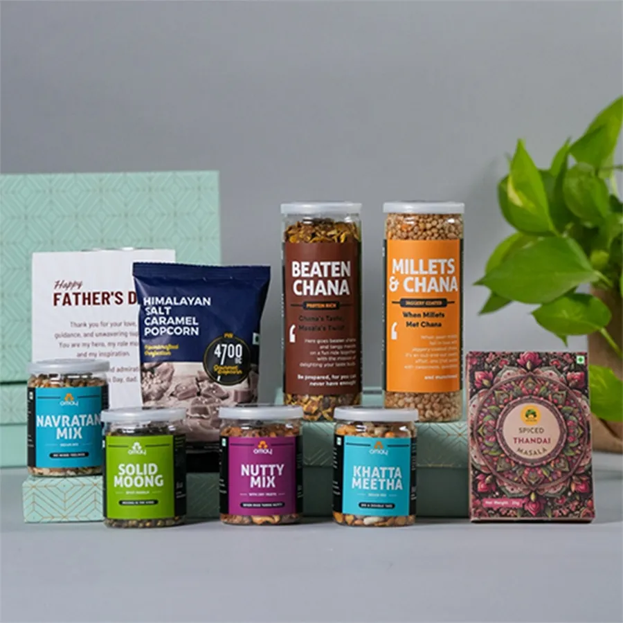 Dads Delight Gourmet Snack N Thandai Hamper featuring assorted snacks like Beaten Chana, Khatta Meetha, Nutty Mix, Caramel Popcorn, and Gulabs Thandai with a Happy Father's Day card