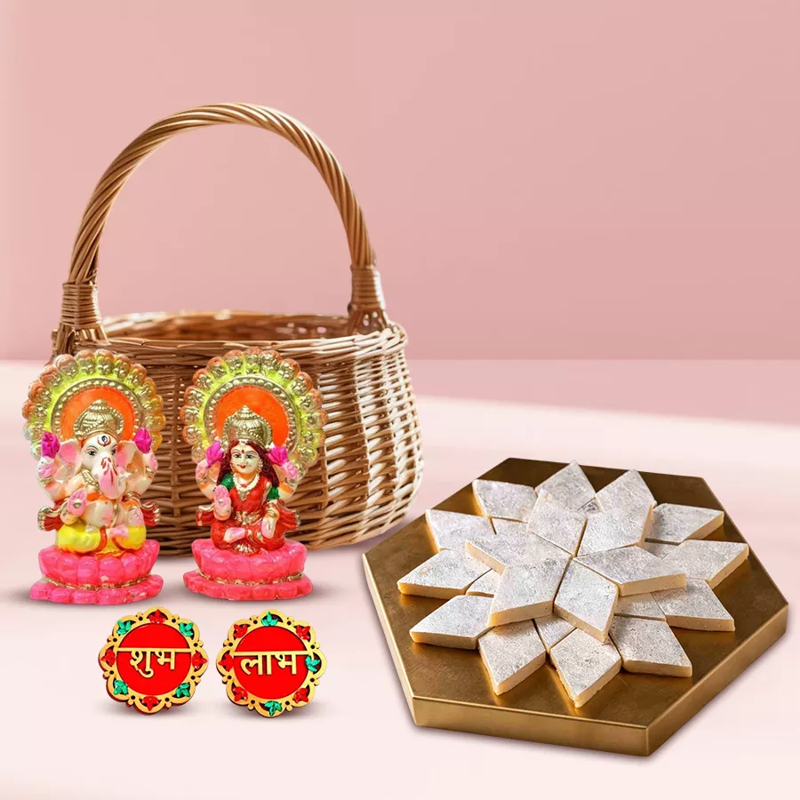 Festive Decor and Sweets Celebration Pack featuring clay Laxmi and Ganesh idols, Kaju Barfi, Shubh Labh sticker set, and a reusable basket
