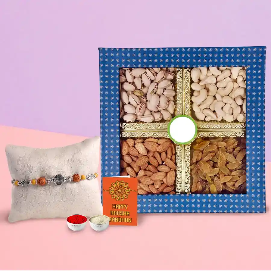 Mixed Dry Fruits pack with a free Rakhi, Roli Tilak, and Chawal displayed together for Raksha Bandhan celebration.