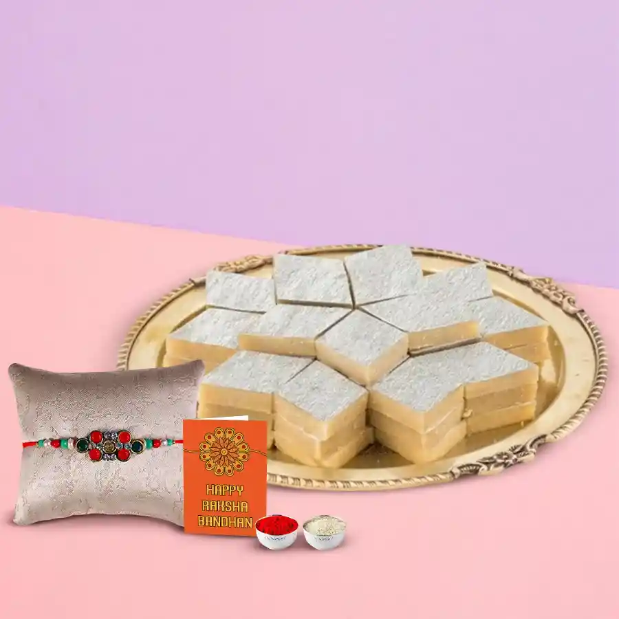 Mouthwatering Kaju Katli with designer Rakhi and free Roli Tilak Chawal for Raksha Bandhan celebration