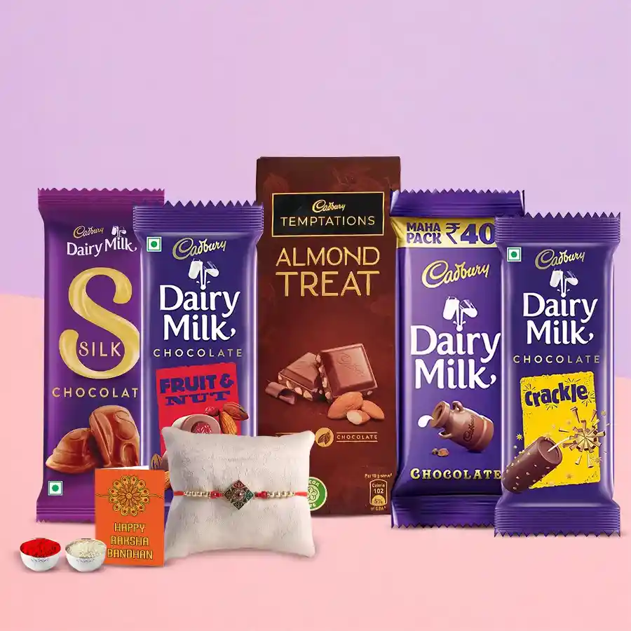 Ecstatic gift hamper filled with Cadbury chocolates, including Temptation, Dairy Milk Silk, Crackle, Fruits & Nuts, and classic Dairy Milk, accompanied by a Rakhi and traditional Roli Tilak and Chawal, perfect for Raksha Bandhan celebration.