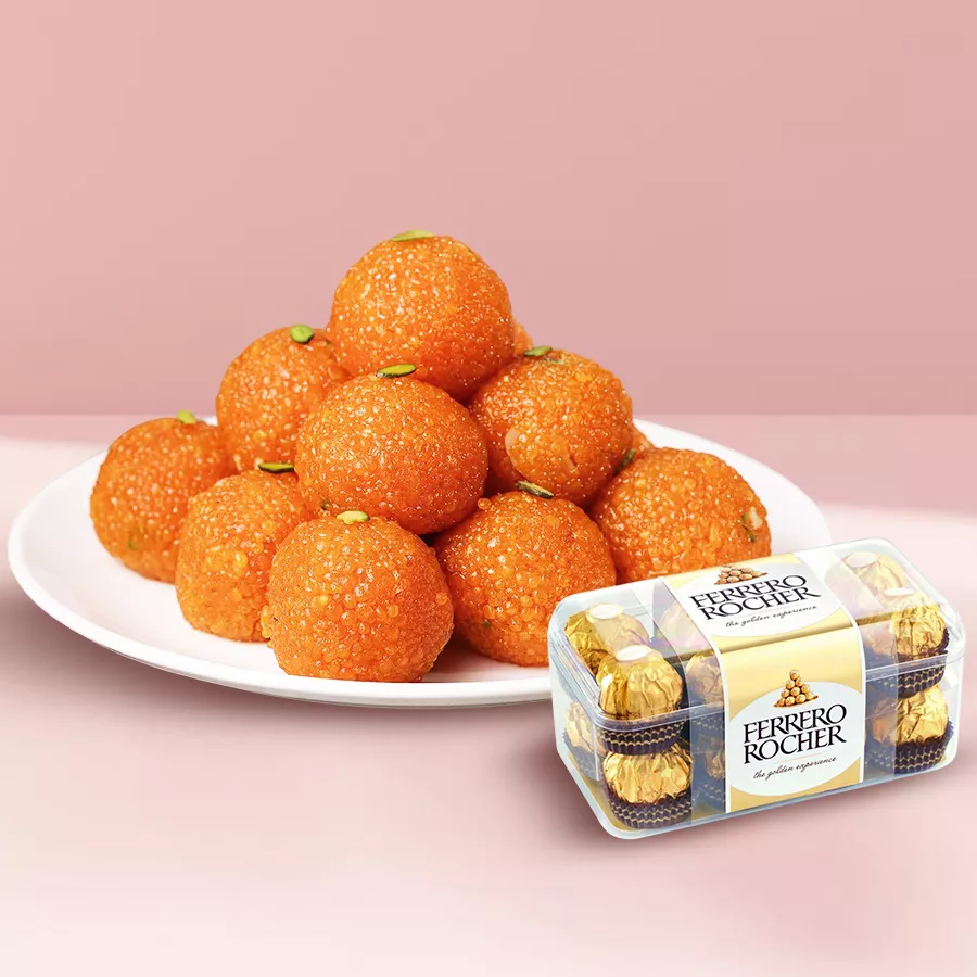 Haldirams laddoos and Ferrero Rocher chocolates gift set arranged beautifully