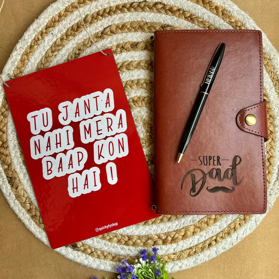 Remarkable Father's Day gift combo set featuring a faux leather travel journal, a sleek metal pen, and a quirky door sign
