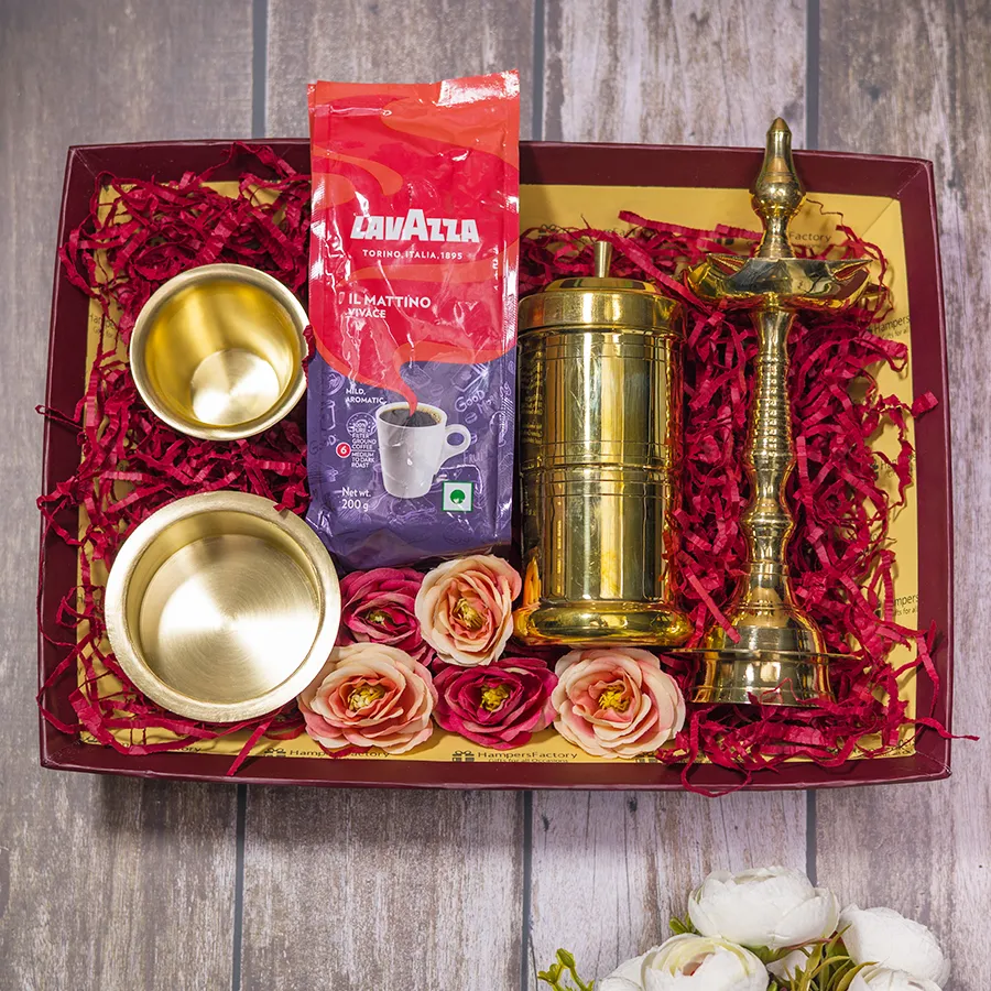 Classic Coffee N Tradition Set featuring Lavazza coffee, a brass filter coffee maker, an elegant brass dabara set, a traditional brass diya, and a reusable designer tray, all showcasing a blend of tradition and style.