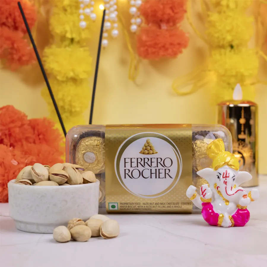 Beautiful Ganesha statue with Ferrero Rocher chocolates and crunchy pista in an elegant gift set