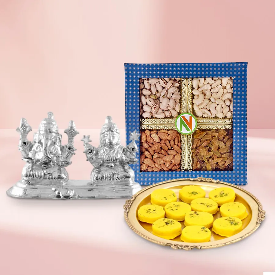 Exquisite gift bundle featuring premium dry fruits, Haldirams Kesaria Peda, and a silver-plated Ganesh Lakshmi idol, perfect for Mother's Day.