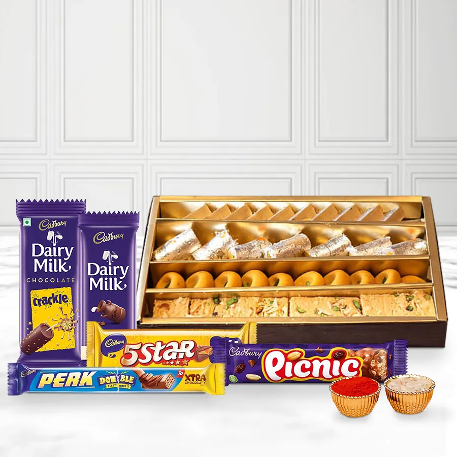 Gift pack of assorted chocolates and Haldiram's assorted sweets for Bhai Dooj, featuring traditional roli, tika, and chawal.