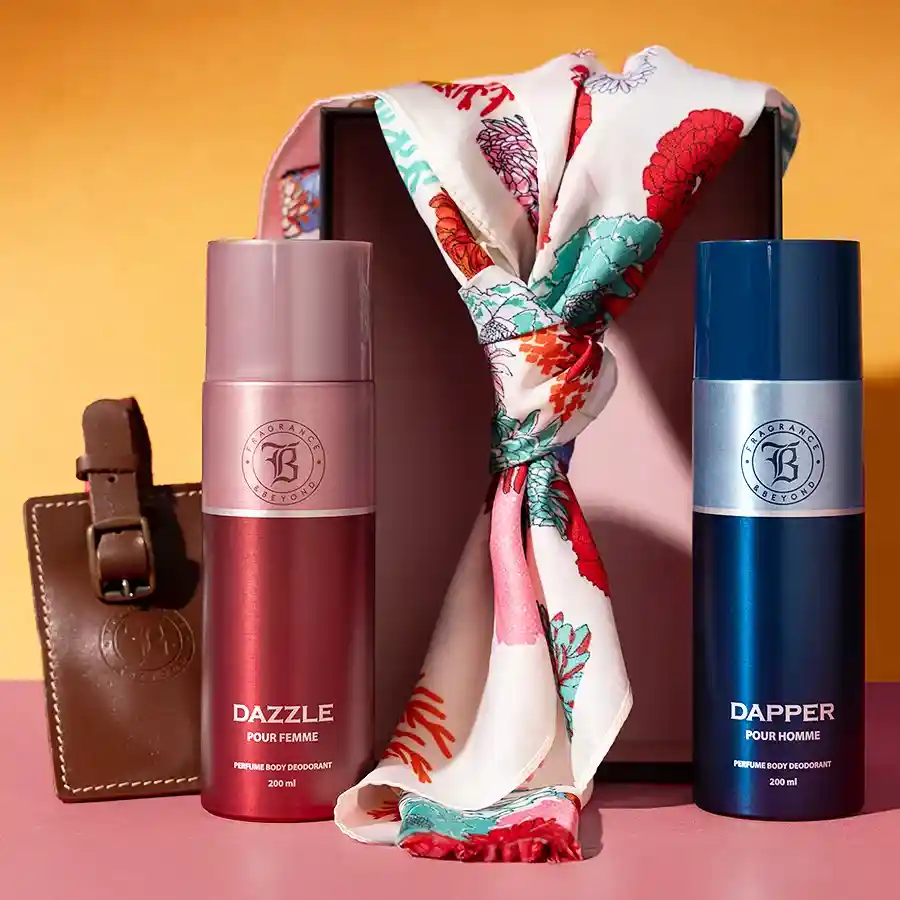 Elegant Traveler Fragrance N Scarf Set featuring two body sprays, a silk scarf, and a leather luggage tag in a stylish presentation