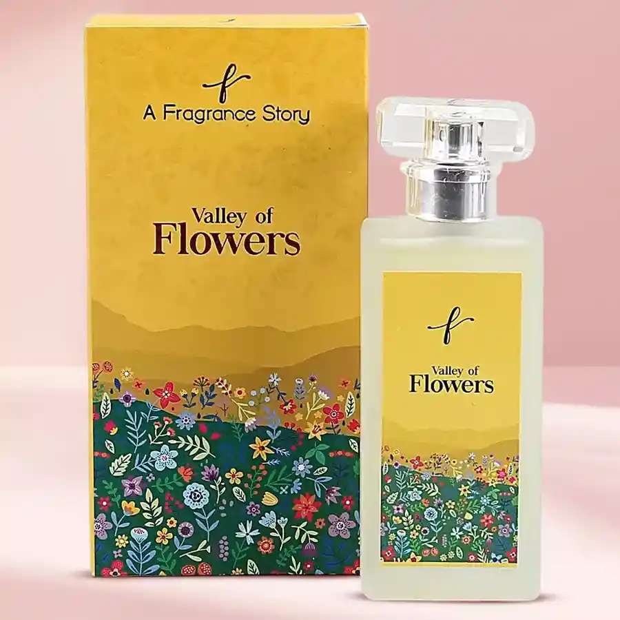 Bottle of Flowerbed Escape Tranquil Valley Essence fragrance with floral and woody notes