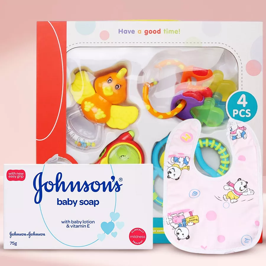Wonderful Baby Set of Summer Essentials including Johnsons Baby Soap, a cotton bib, and four colorful rattles