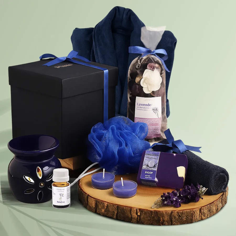 Ecstatic Lavender Soap Spa Set with a plush bathrobe, including lavender soaps, a soft face towel, an aromatic diffuser, lavender potpourri, a bath puff, and tea lights arranged elegantly for a serene spa experience.