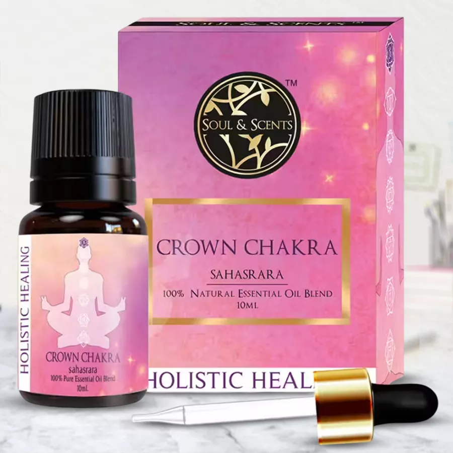 Exclusive Crown Chakra Essential Oil bottle with a calming label and natural background