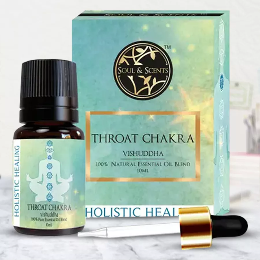 Bottle of Remarkable Throat Chakra Essential Oil with a calming blue label, set against a serene background.
