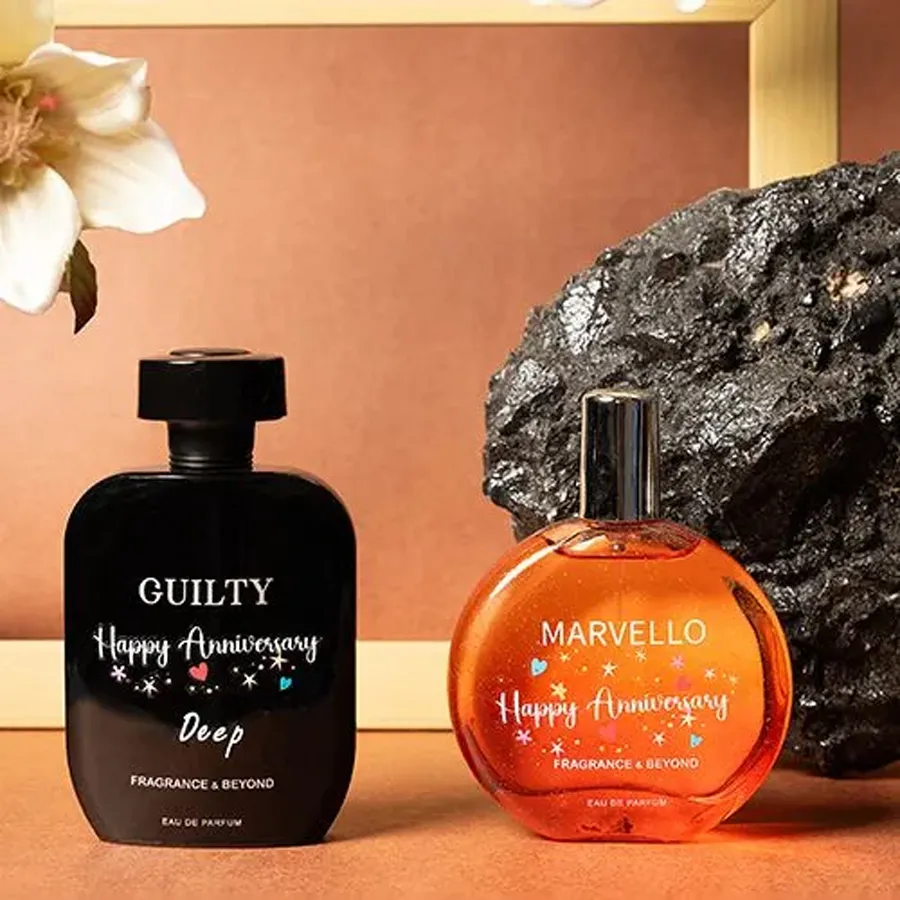 Amber Woody Perfume Set for Couples featuring Guilty EDP and Marvello EDP in elegant packaging