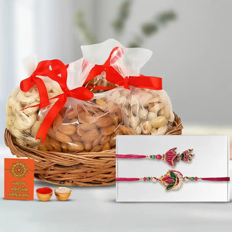 Enticing Gift of Bhaiya Bhabhi Rakhi with Exotic Dry Fruits Basket