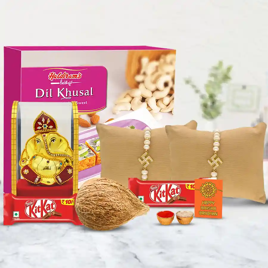 Fantastic Swastik Rakhi Pair with Haldiram Sweets, chocolates, and puja items
