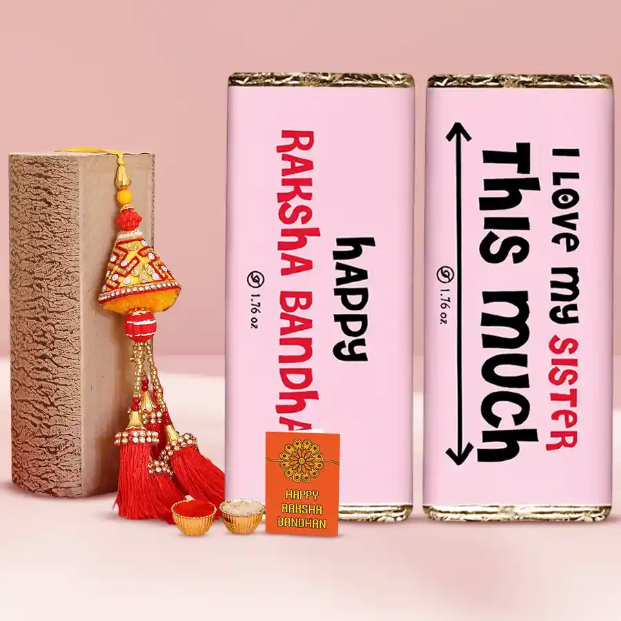 chocolate gift box for sister with Cadbury Crackle and Dairy Milk Fruit & Nut bars, a beautiful Rakhi, and complimentary Roli, Tilak, and Chawal.