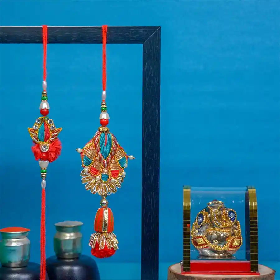 Ganesha Blessings with Couple Rakhi