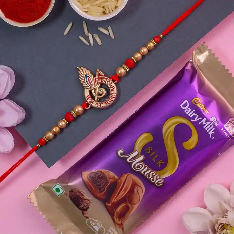 Premium Krishna Rakhi N Cadbury Silk Mousse Combo